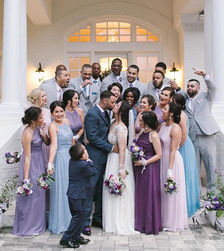 purple and blue wedding party with matching dresses, ties and pocket squares